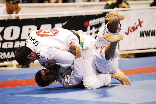 Roger Gracie catches Romulo Barral with a choke from the mount at the 2009 Worlds. Photo by Regis Chen