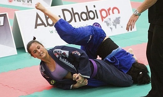 In the area surrounding London, a purple belt snags an arm at the World Pro tryouts. Publicity photo shot by James Oluoch-Oluny