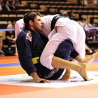Bochecha demonstrates one of his trumps from butterfly-guard