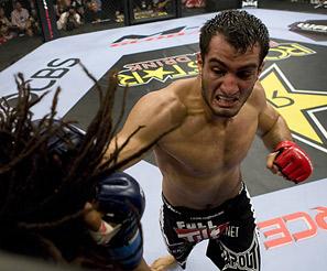 Mousasi punishes Sokodjou. Photo: Esther Lin