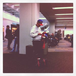 A lone Giants fan at the dismal airport following the 49ers' defeat