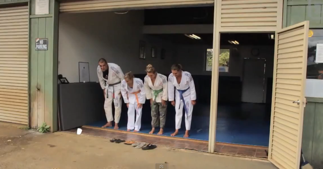 Professional Surfer Girls Learn Lesson on the Mat