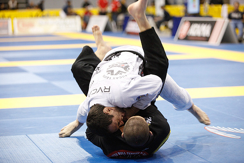 Get the wristlock without even opening guard, as taught by Calasans