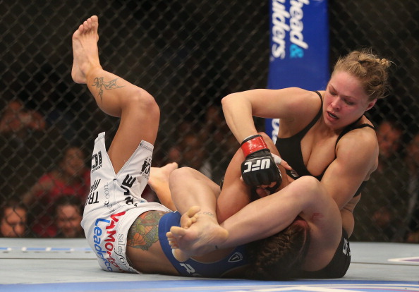 Ronda Rousey fights Liz Carmouche during their UFC Bantamweight Title bout at Honda Center on February 23, 2013 in Anaheim, California.  (Photo by Jeff Gross/Getty Images)