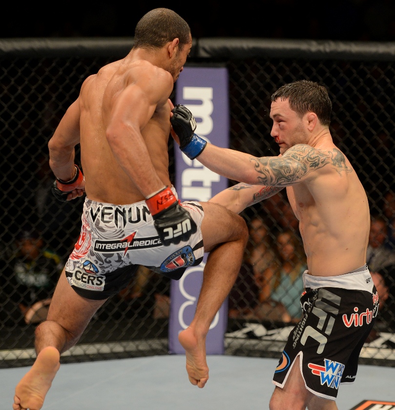 José Aldo voa em joelhada sobre Frankie Edgar. Foto: UFC/Divulgação