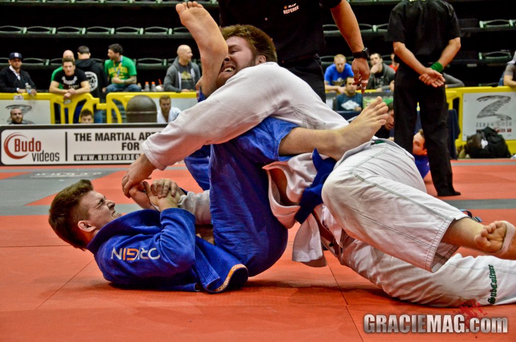 Dante Leon attempts an armbar in the blue belt adult absolute division. Photo: Erin Herle