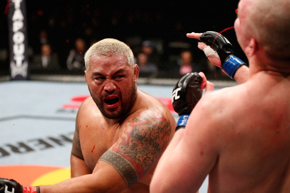 Mark Hunt (left) is frustrated with the issues preventing him from making his way to the U.S. for his UFC 160 fight with Junior dos Santos. (Photo by Josh Hedges/Zuffa LLC/Zuffa LLC via Getty Images)