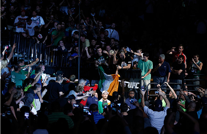 Conor McGregor gets massive greeting from fans during his UFC Fight Night 26 walkout. Photo via Getty Images.