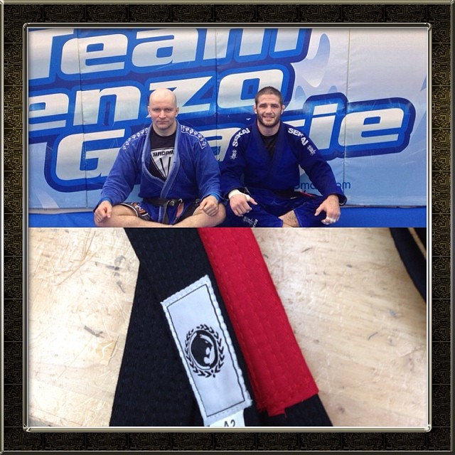 Travis Stevens receives his black belt from John Danaher. Instagram: @judosilencer