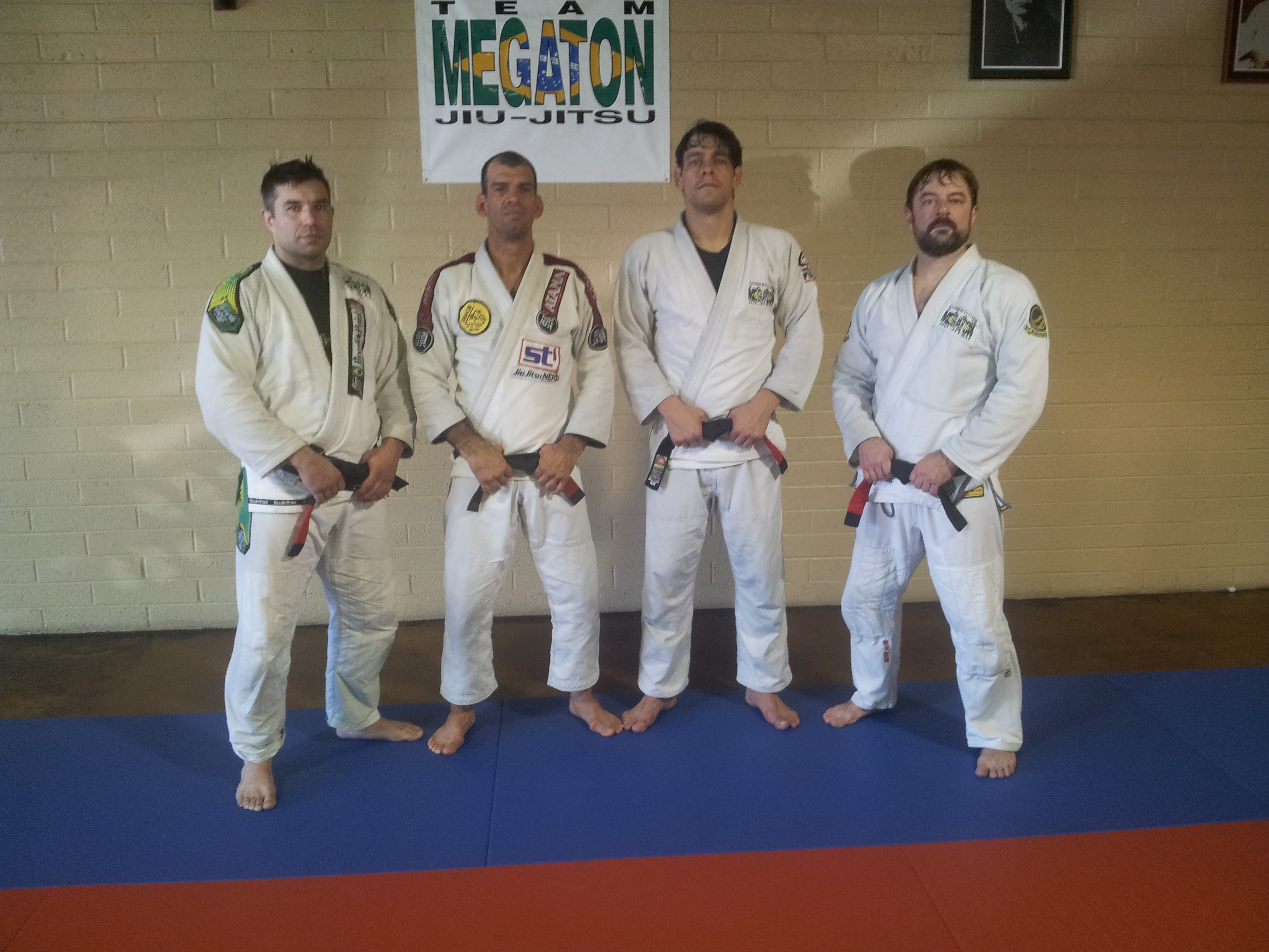 Three new black belts promoted by Wellington Megaton Dias. Photo: Personal Archive