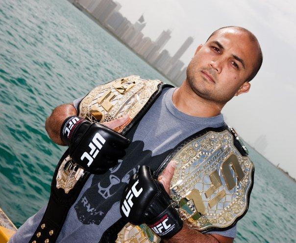BJ-Penn-Holding-His-UFC-Champion-Belts-1.jpg