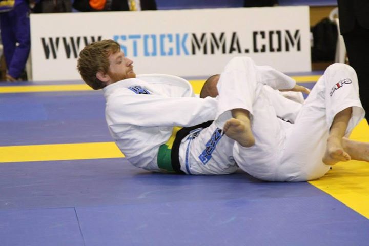 Kev Capel submits with the bow and arrow choke. 