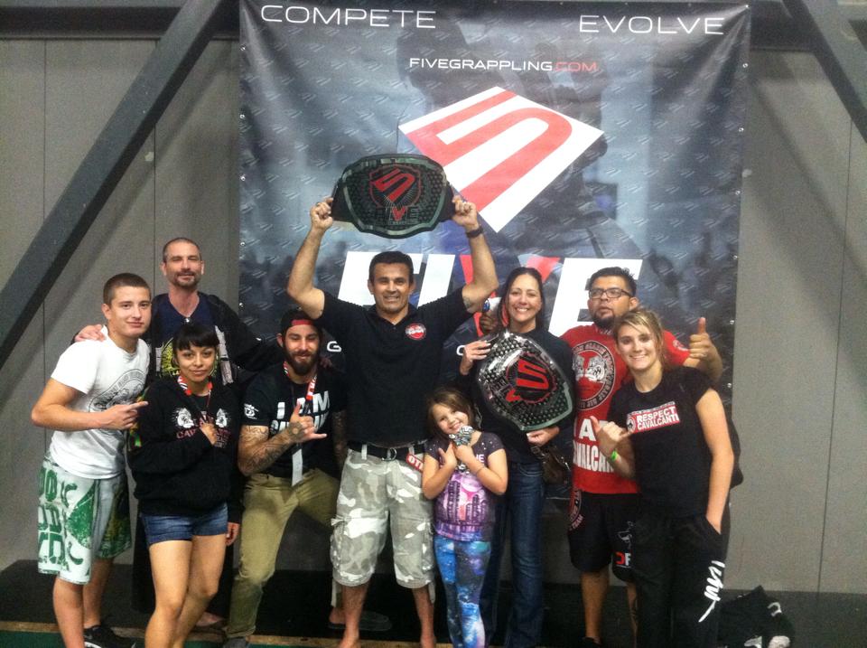 The Cavalcanti Jiu-Jitsu Team with their team trophies. Photo: Personal Archive