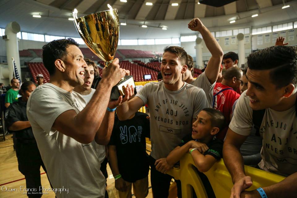 Celebrating the win with the coaches. Photo: Owen Francis Photography