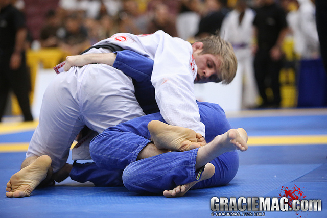 AJ Agazarm works to pass the half guard. Photo: Erin Herle