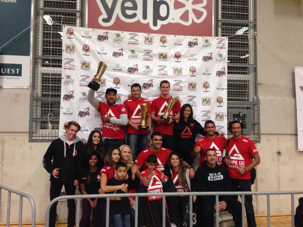 Gracie Barra team members at the podium in Australia.