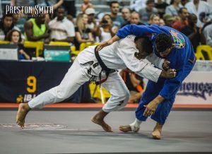 Tim charges for the takedown. Photo: Preston Smith