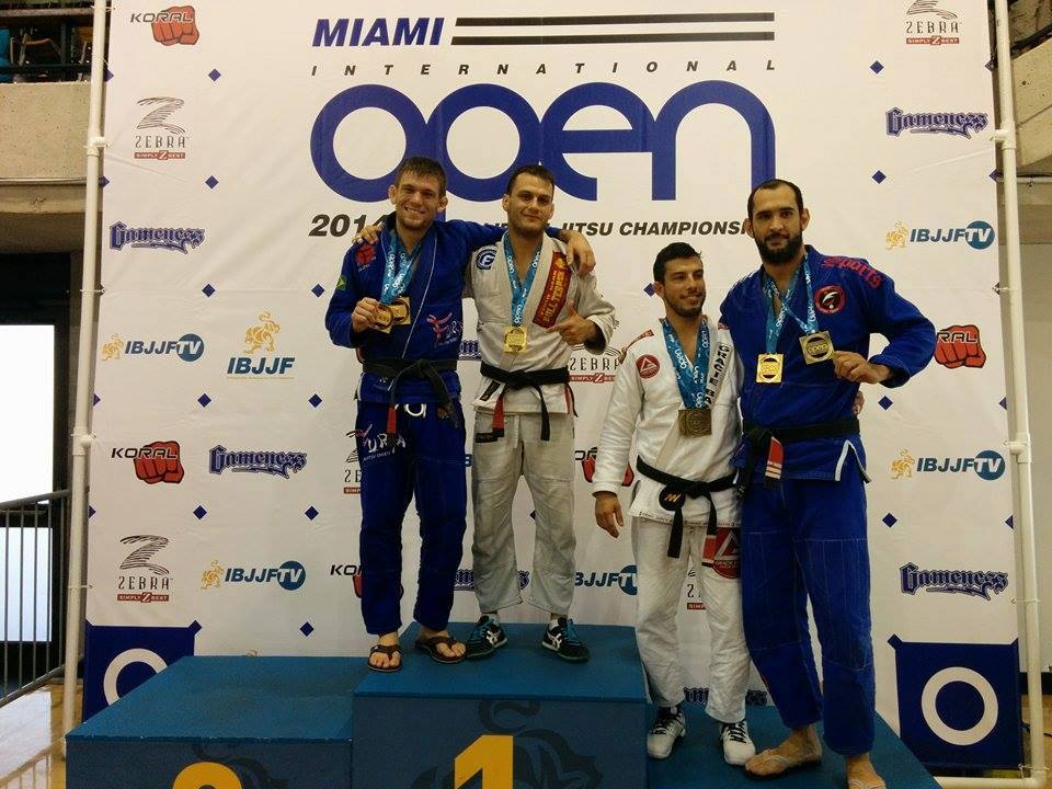 The adult male black belt open class podium