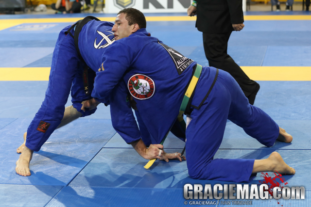 Leo Nogueira beat Keenan Corneliu's dangerous guard game to secure a place in the open class podium at the 2015 Pan. Photo by Ivan trindade/GRACIEMAG