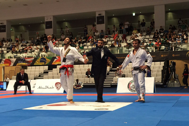 Roberto Satoshi celebrates his win over Celso Venícius in the 77kg division final