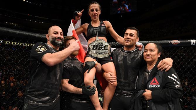 Joanna Jedrzejczyk def. Karolina Kowalkiewicz via unanimous decision. UFC