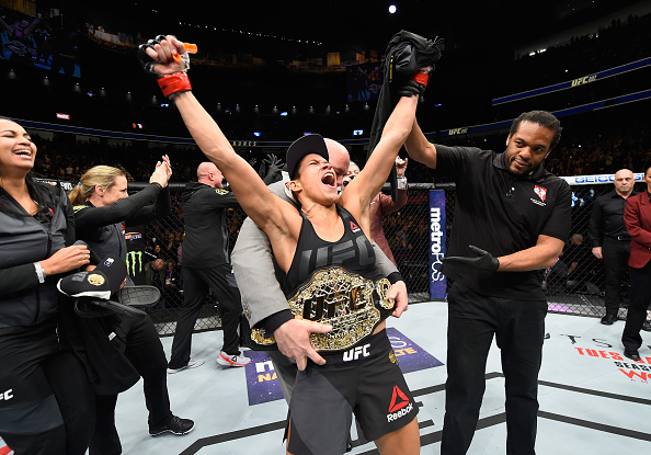 LAS VEGAS, NV - DECEMBER 30:  Amanda Nunes of Brazil reacts to her victory over Ronda Rousey in their UFC women's bantamweight championship bout during the UFC 207 event at T-Mobile Arena on December 30, 2016 in Las Vegas, Nevada.  (Photo by Josh Hedges/Zuffa LLC/Zuffa LLC via Getty Images)