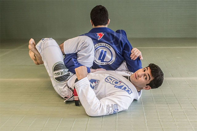 Lucas Lepri teaches how to pass the one-leg X-guard landing on the omoplata